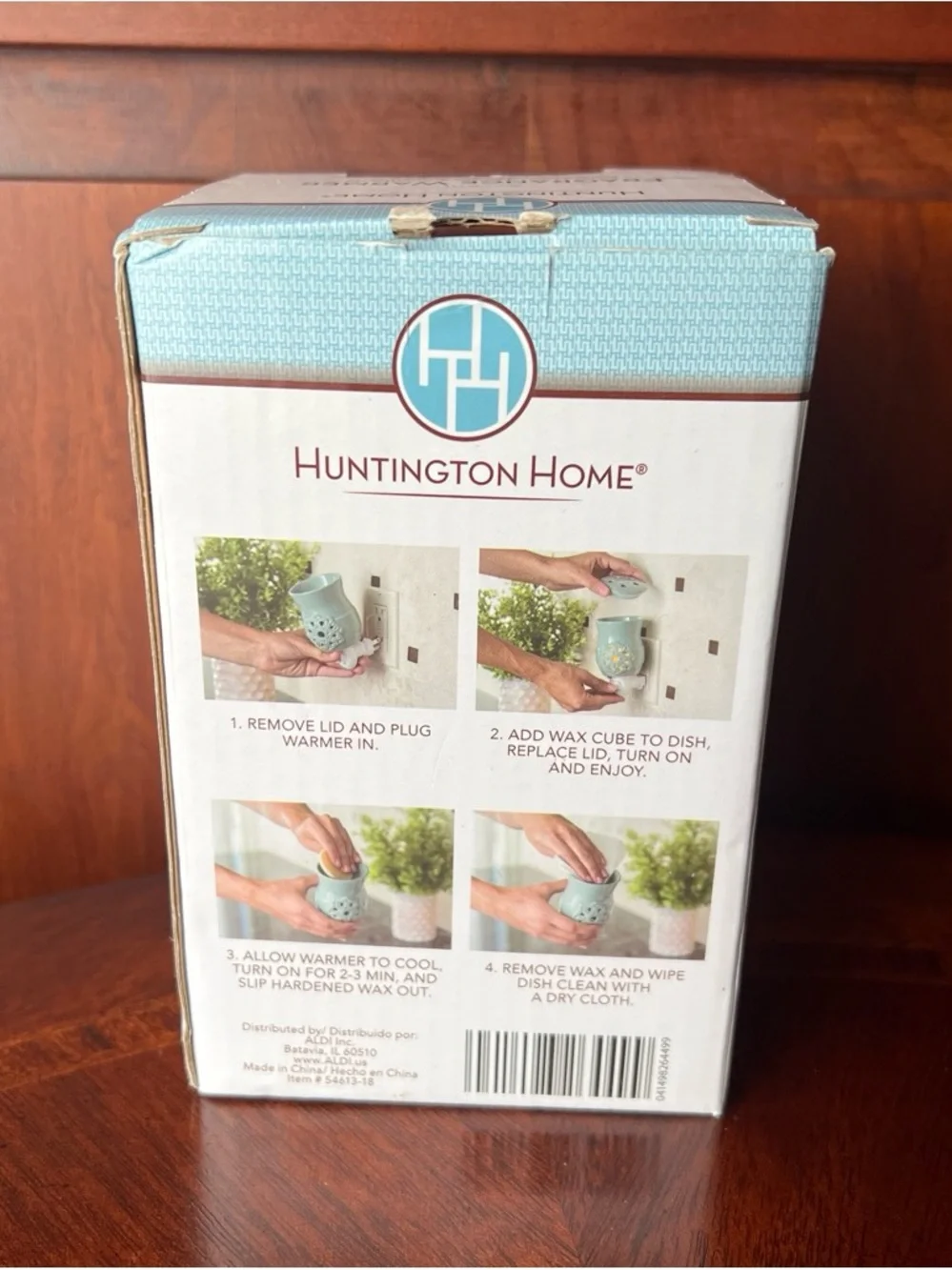 New Huntington Home teal fragrance warmer with floral design Plug- In